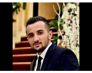 TOLGA ARTAN